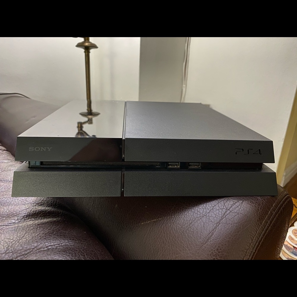Sony PlayStation 4 500GB used plus 8 games